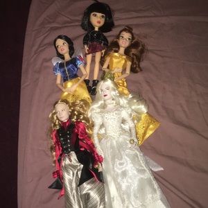 Lot of Disney dolls and “Yuki” doll.